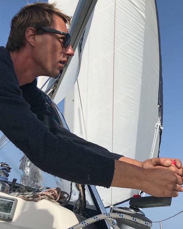 Captain Cristian is working on a catamaran boat